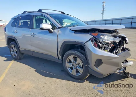 2022 Toyota Rav4 Hybrid Le from USA, damaged, VIN JTMMWRFV0ND566666